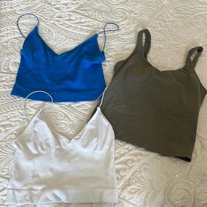 Buy as a set of 3!!!  Tight short tank tops!